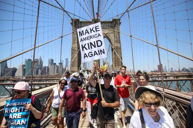 The Keep Families Together March heads over the Brooklyn Bridge in late June